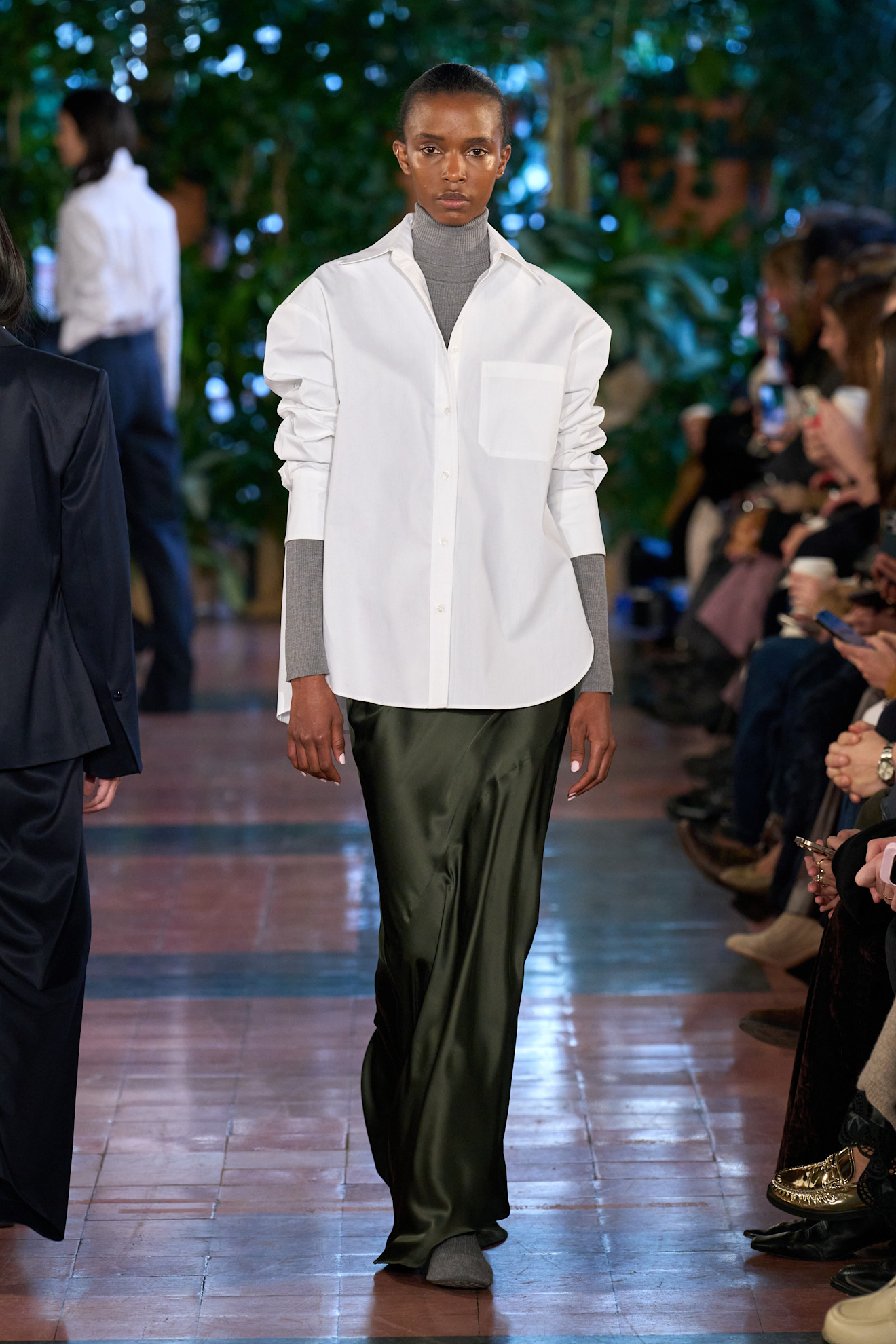 Toteme runway featuring the flat sock boot trend