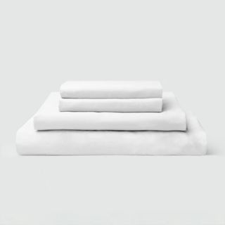 Sijo CrispCool Organic Percale Sheet Set against a gray background. 