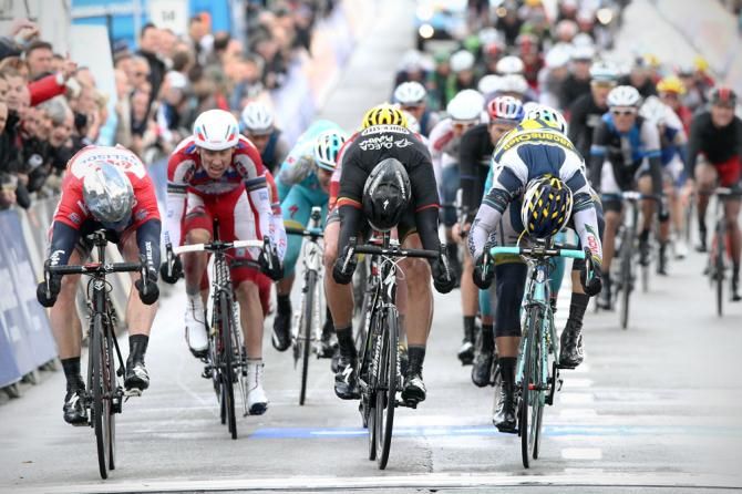 Tour of Belgium leader Andre Greipel (Lotto Belisol), left, won stage 2 in a photo finish ahead of Danny van Poppel (Vacansoleil-DCM), right, and Belgian champion Tom Boonen (Omega Pharma-QuickStep)