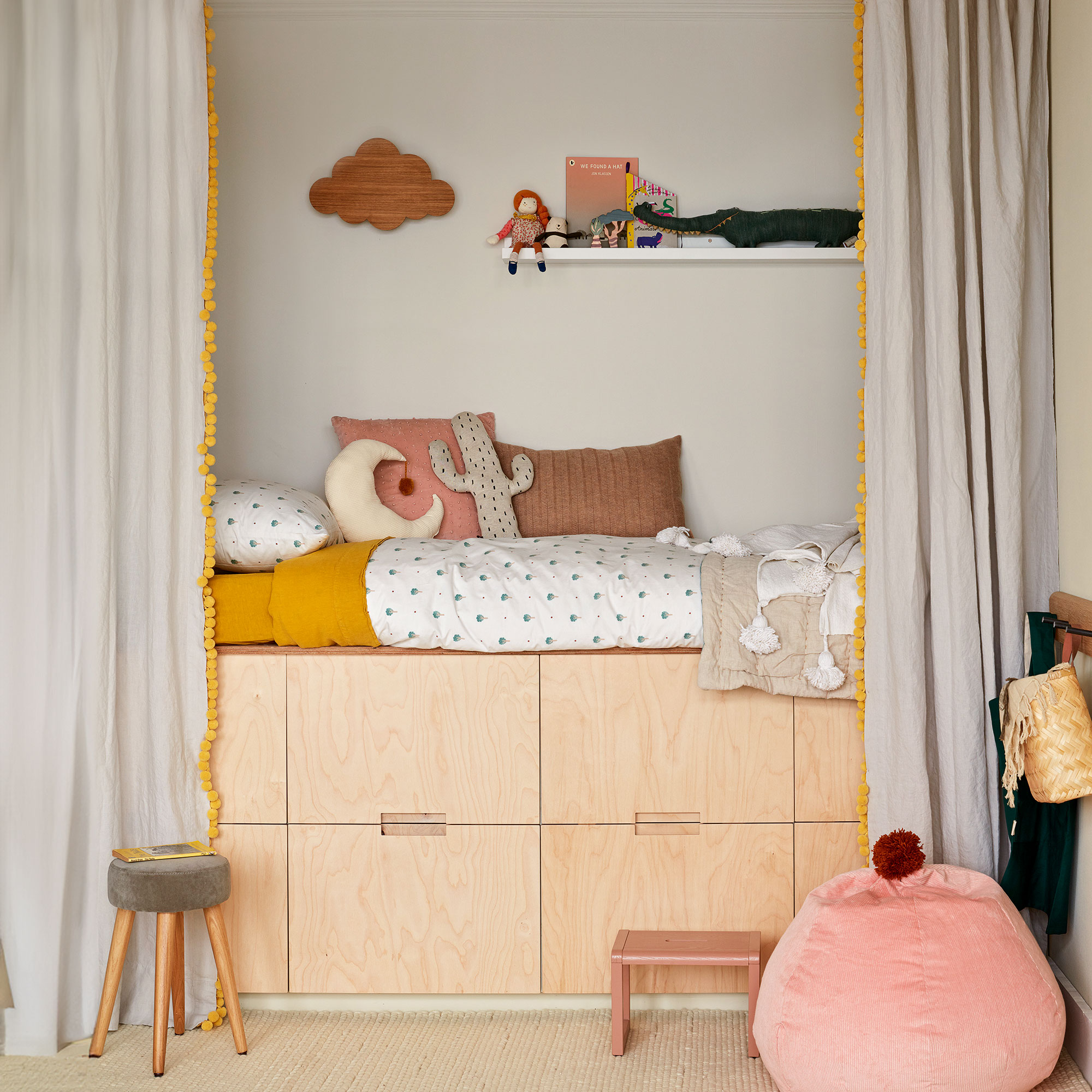 Kids room with built in storage underneath bed