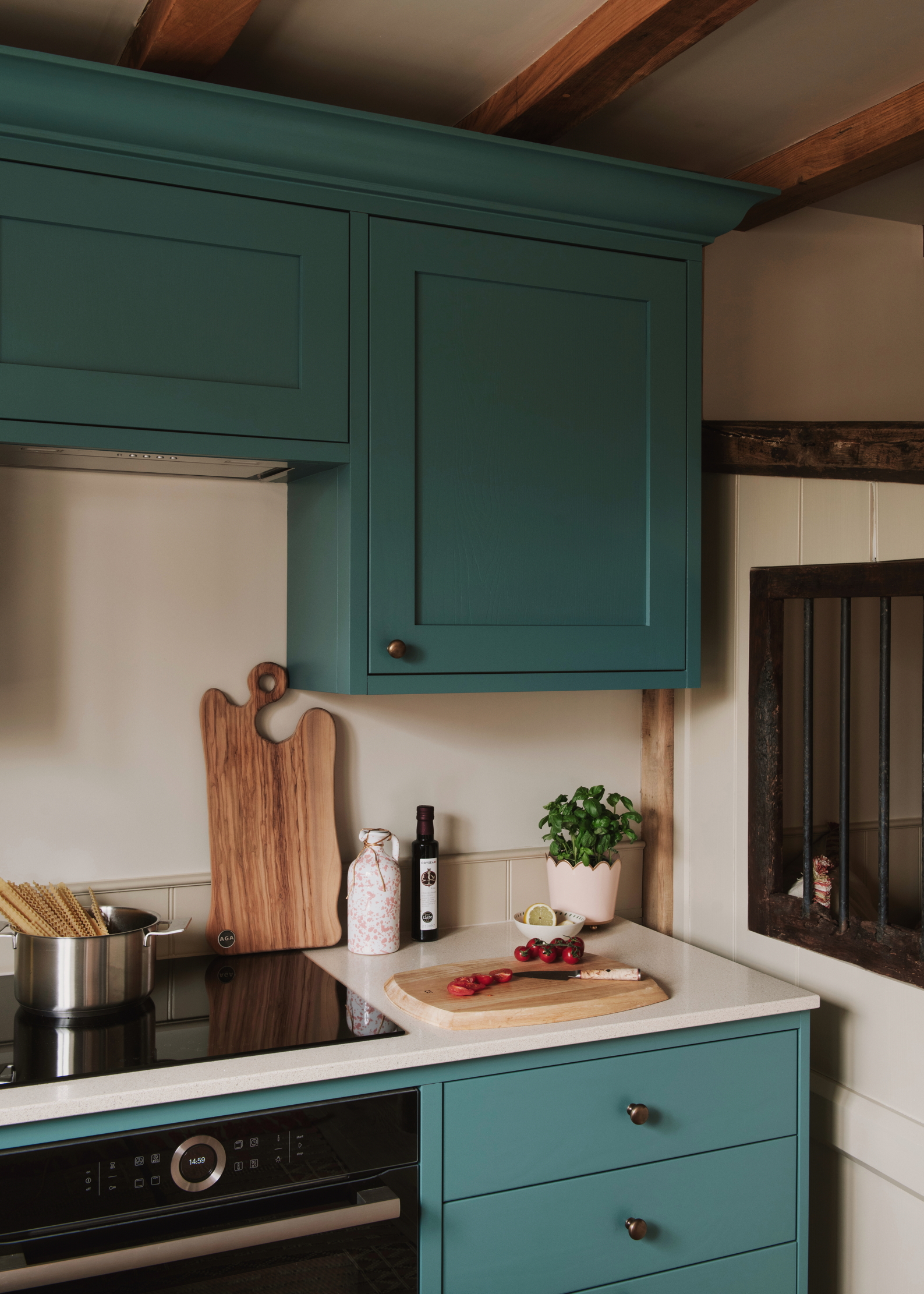 The farmhouse style interior of Monxton, with blues, reds, and natural wood finishes throughout.