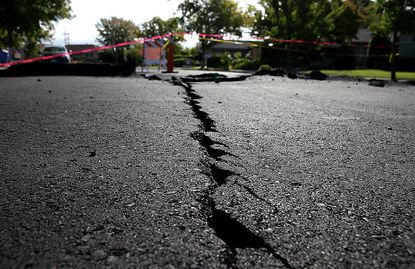 A cracked road from a 2014 earthquake in California