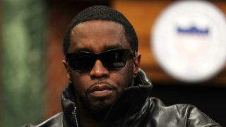 Diddy in sunglasses after donating to Howard University 