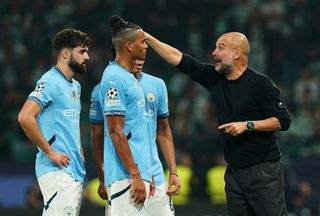 LISBON, PORTUGAL - NOVEMBER 05: Pep Guardiola, Manager of Manchester City, gives instructions to the team during the UEFA Champions League 2024/25 League Phase MD4 match between Sporting Clube de Portugal and Manchester City at Estadio Jose Alvalade on November 05, 2024 in Lisbon, Portugal. (Photo by Gualter Fatia/Getty Images)