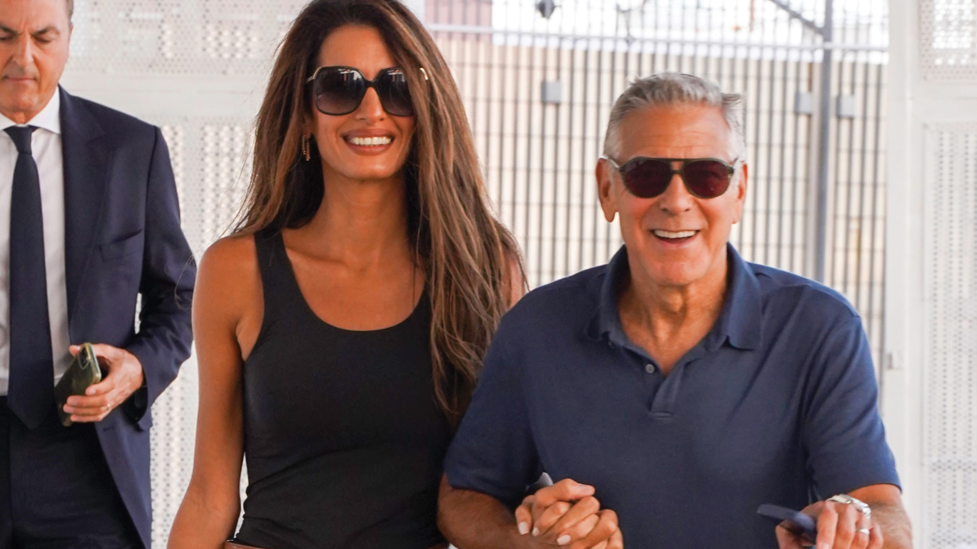 George and Amal Clooney depart Venice in effortless style following the 83rd Venice International Film Festival.
