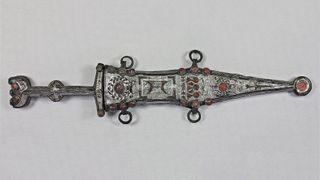 The 2,000-year-old dagger and sheath.