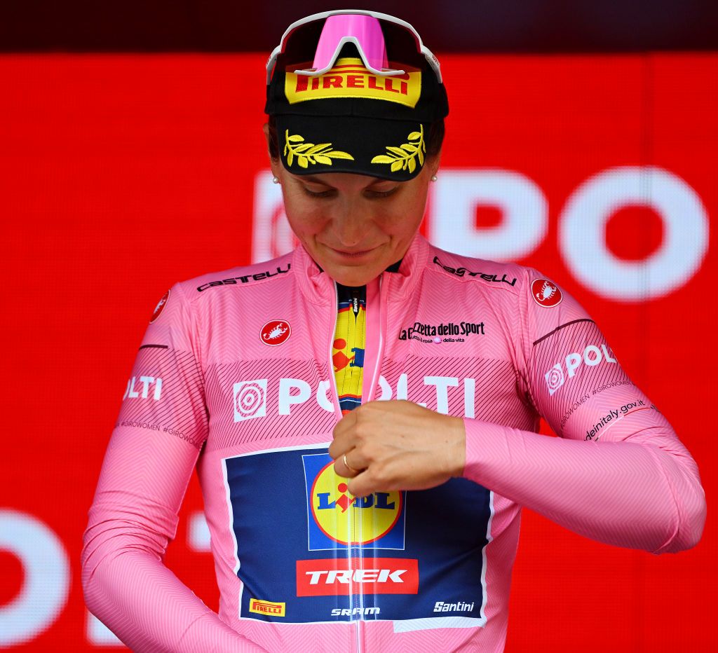 BRESCIA ITALY JULY 07 Elisa Longo Borghini of Italy and Team Lidl Trek celebrates at podium as Pink Leader Jersey winner during the 35th Giro dItalia Women 2024 Stage 1 a 157km individual time trial stage from Brescia to Brescia UCIWWT on July 07 2024 in Brescia Italy Photo by Luc ClaessenGetty Images