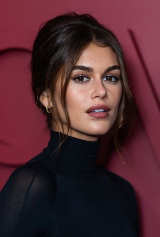 Kaia Gerber with French Twist hairstyle