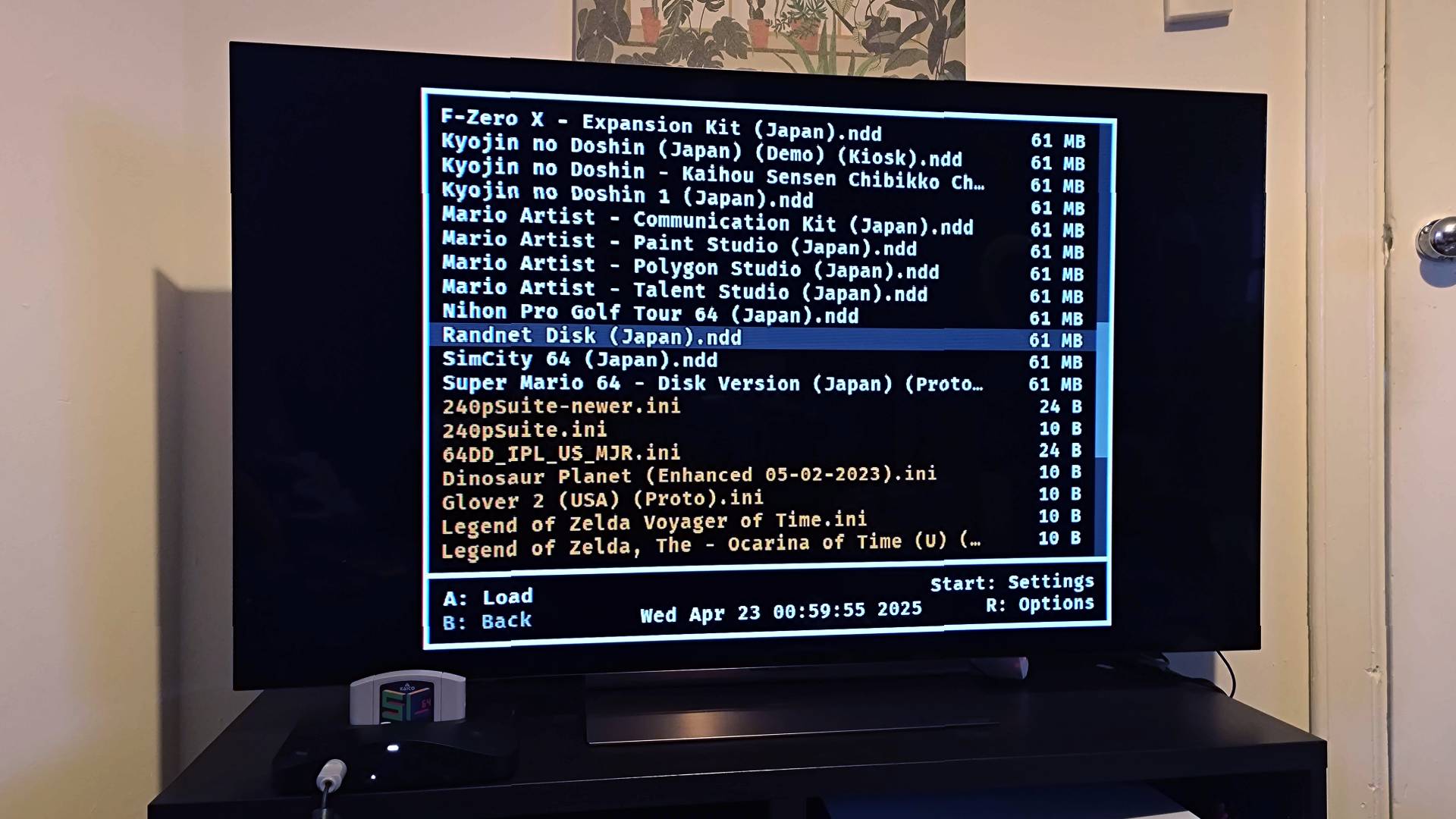 Analogue 3D connected to LG OLED C4 TV with Summercart 64 menu displayed.