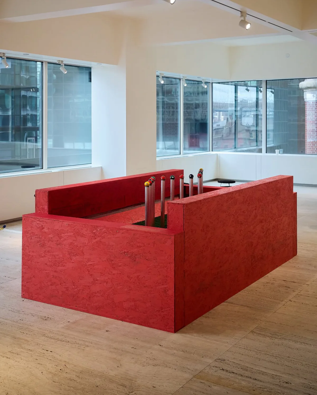 red art installation in corporate building