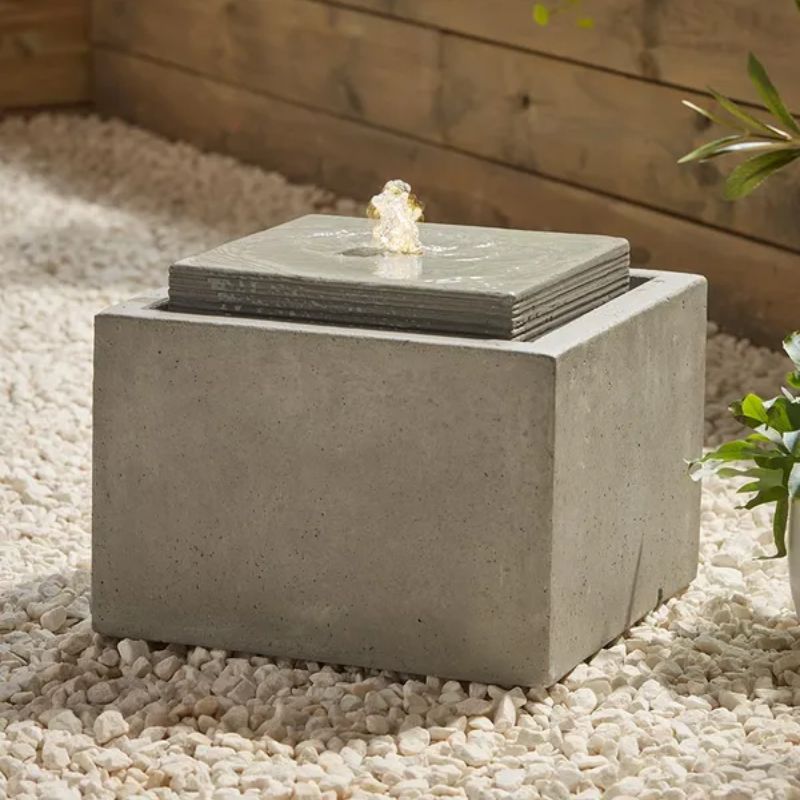 square water fountain in garden