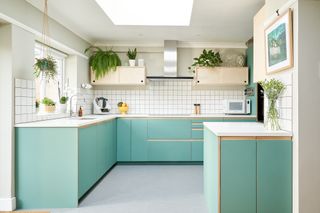 Ikea kitchen with Plykea doors in Fenix Bloom 'Verde Brac' with birch J-Profile handles