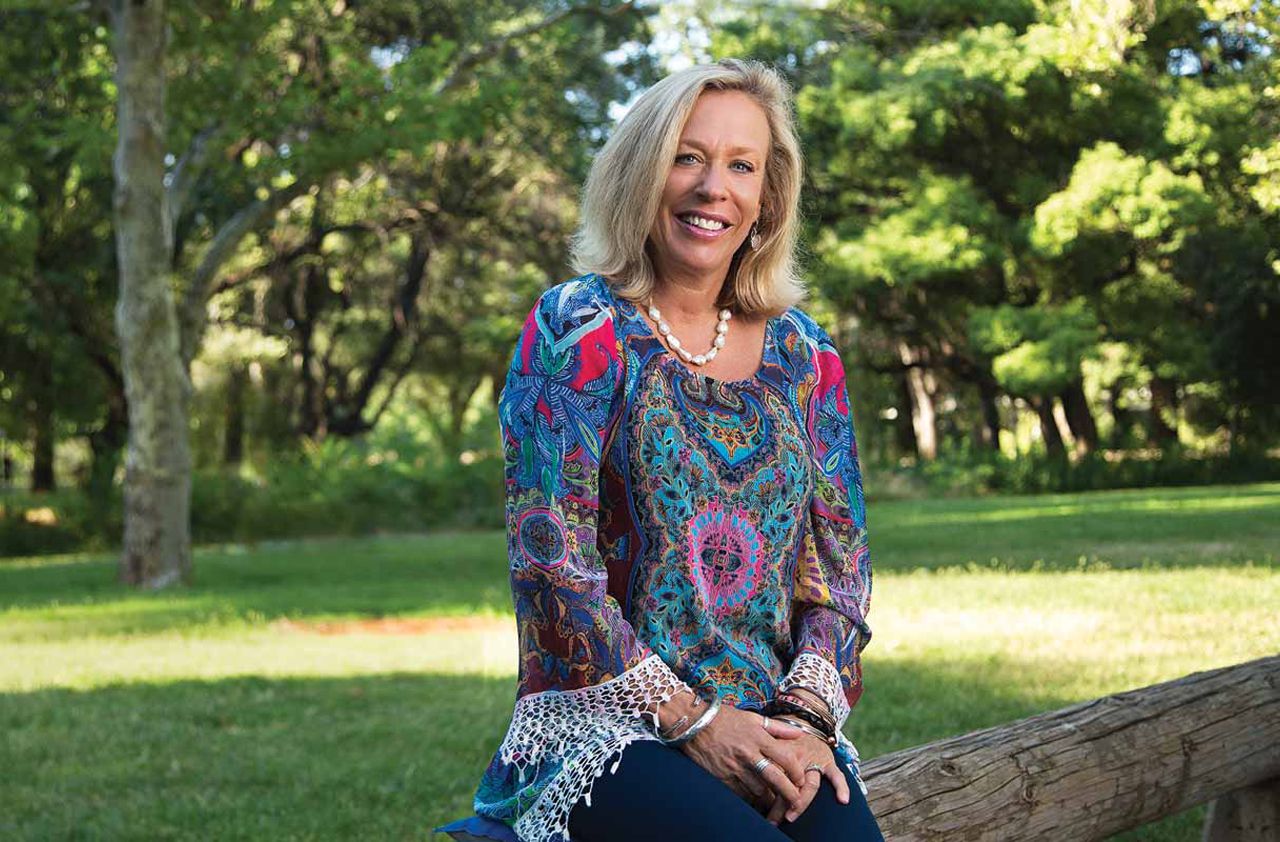 Photograph of Hilary Graf in. a sunny garden