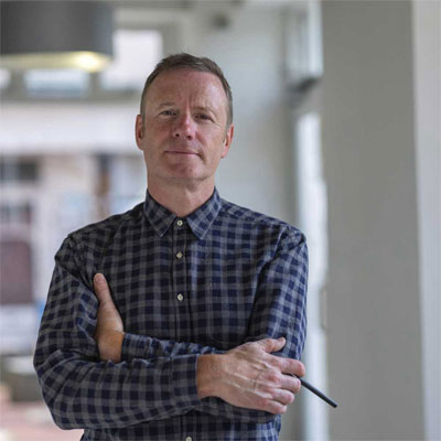 picture of heating expert Nick Duggan a man wearing a blue checked shirt
