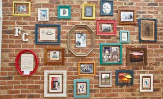colourful picture frames in a kitchen diner