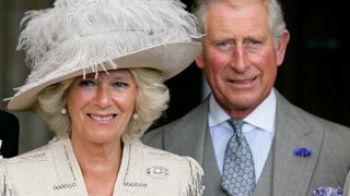 Camilla, Duchess of Cornwall and Prince Charles, Prince of Wales attend the wedding of Ben Elliot and Mary-Clare Winwood at the church of St. Peter and St. Paul, Northleach on September 10, 2011 in Cheltenham, England.