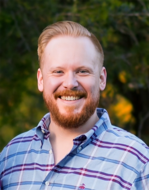 Smiling headshot of Nick Haring.