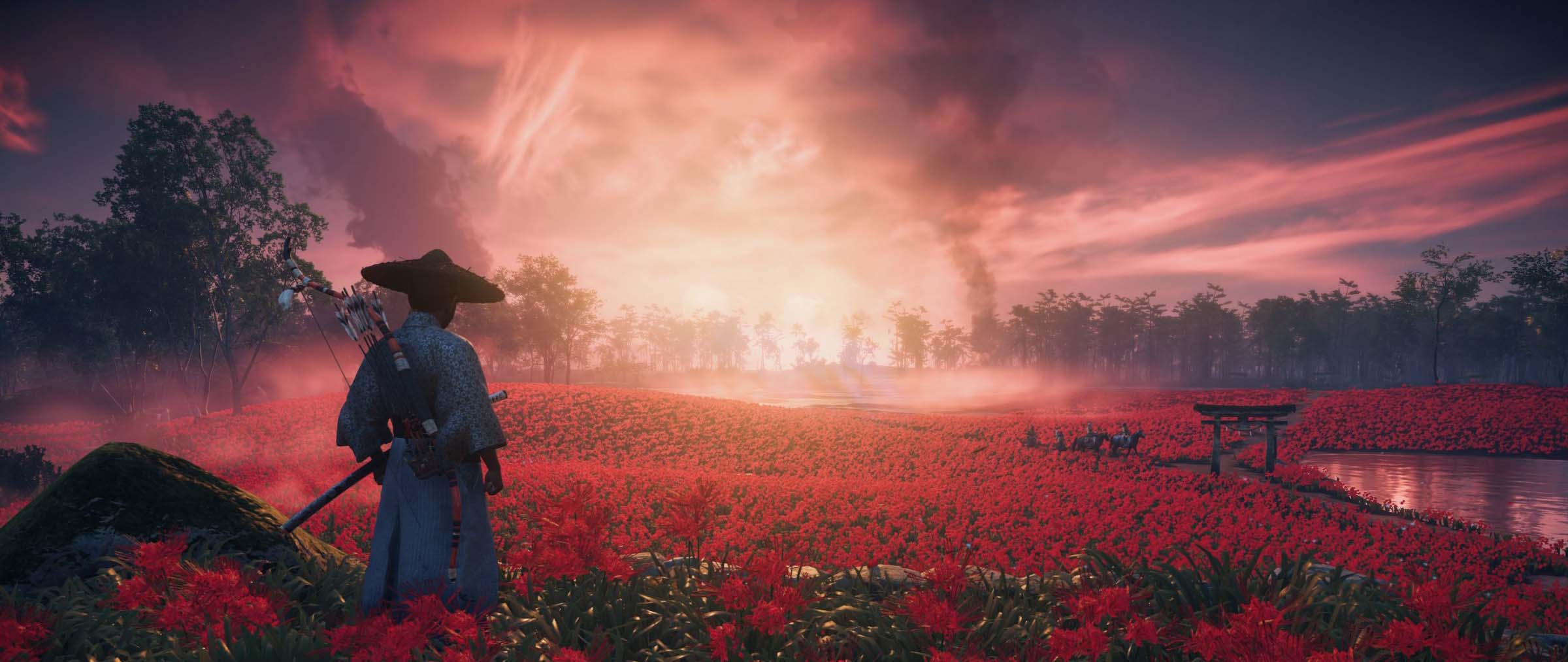 Ghosts of Tsushima - Samurai stands in a field of red flowers