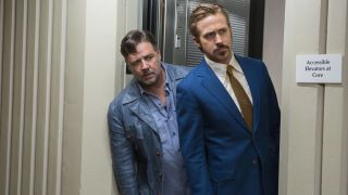 Jackson and Holland peer around a door frame in The Nice Guys
