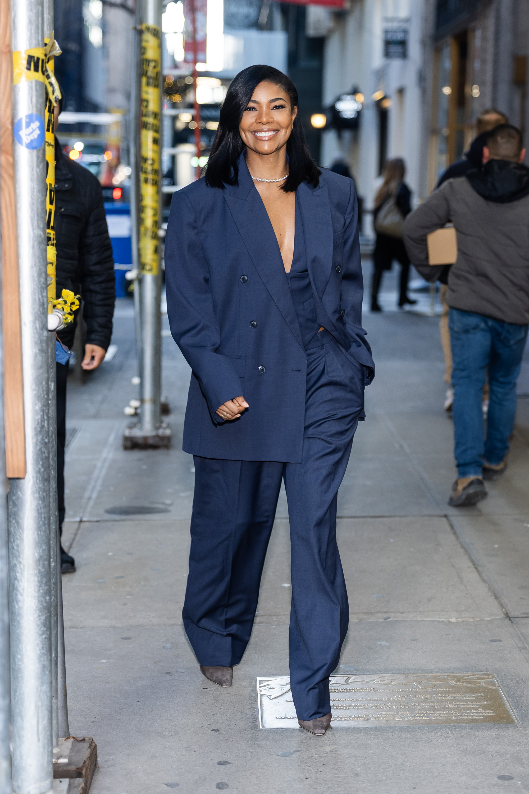 Gabrielle Union in NYC wearing an oversize navy blue blazer