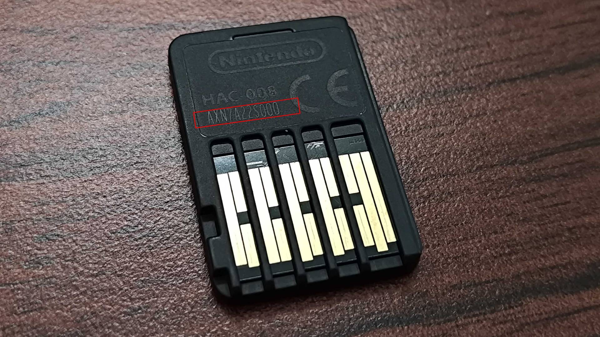 Back of Switch cartridge with red box around serial number.