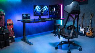 Asus ROG Destrier Ergo gaming chair from the back with a gaming PC