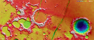 This color-coded topographic view shows the relative heights of features in Mars’ Cerberus Fossae region: reds and whites are relatively higher than blues and purples. The image is based on a digital terrain model of the region, from which the topography of the landscape can be derived.