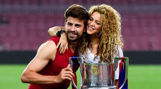 Gerard Pique and Shakira with the Copa del Rey trophy at Camp Nou in 2015.