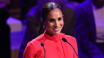 Meghan Markle Wore Beige Wide-Leg Pants in Germany