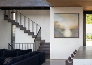 minimalist staircase and artwork at Sound House in Seattle
