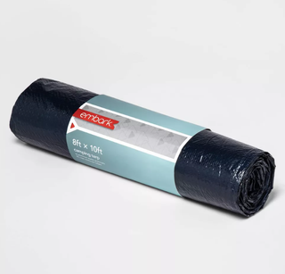 a rolled up navy blue tarp
