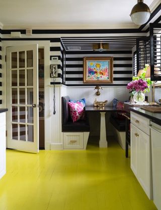 kitchen with yellow floorboards