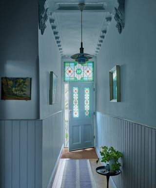 blue painted entryway with painted ceiling by farrow and ball
