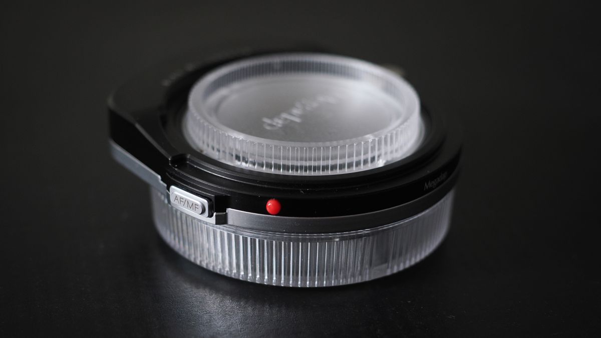 Megadap M2RF adapter on a black surface