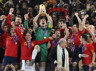 Spain goalkeeper and captain Iker Casillas lifts the World Cup trophy, 2010