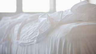 White bedsheets on single duvet, clean