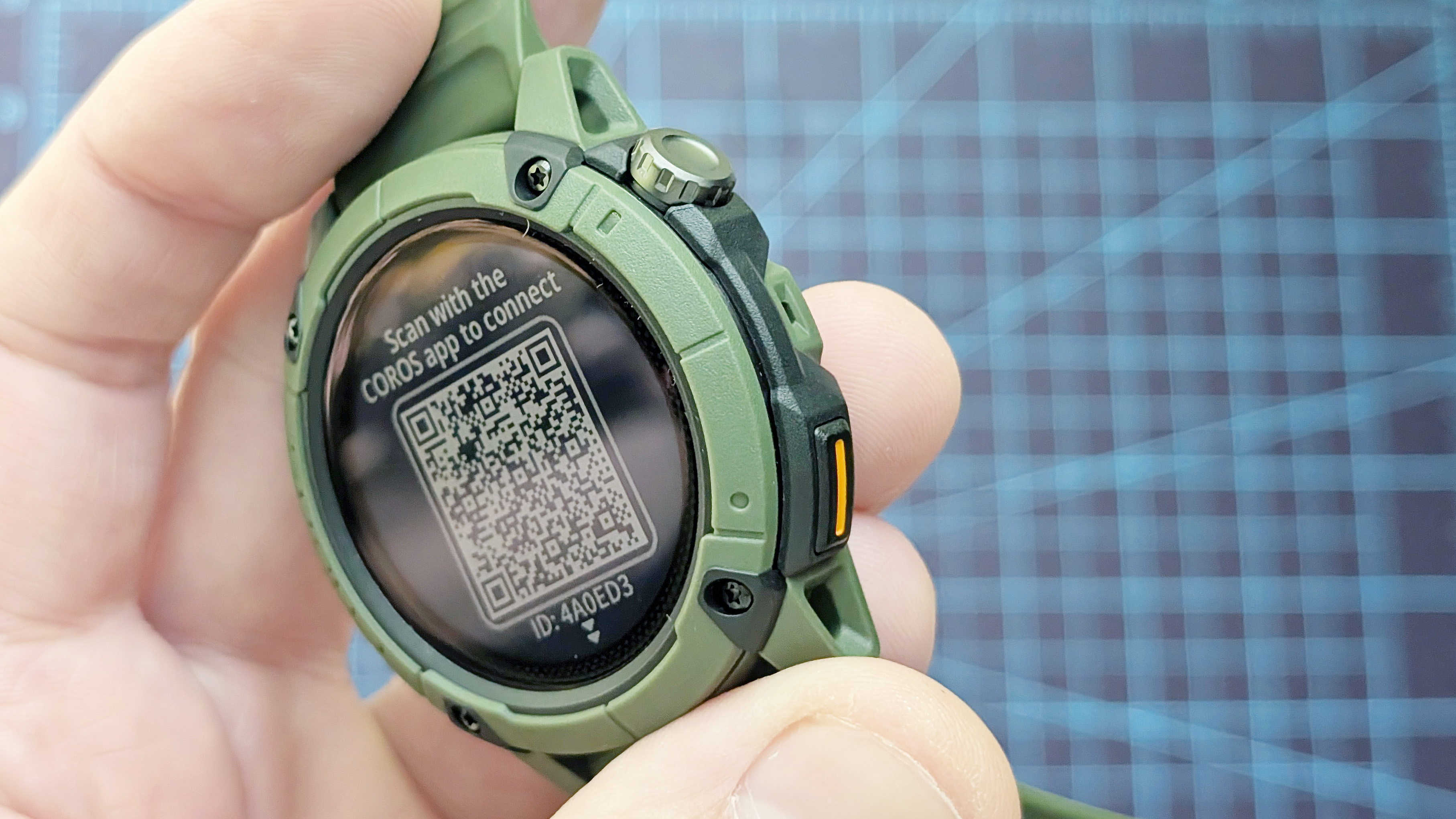 Close-up of the Coros Nomad rugged smartwatch in dark green