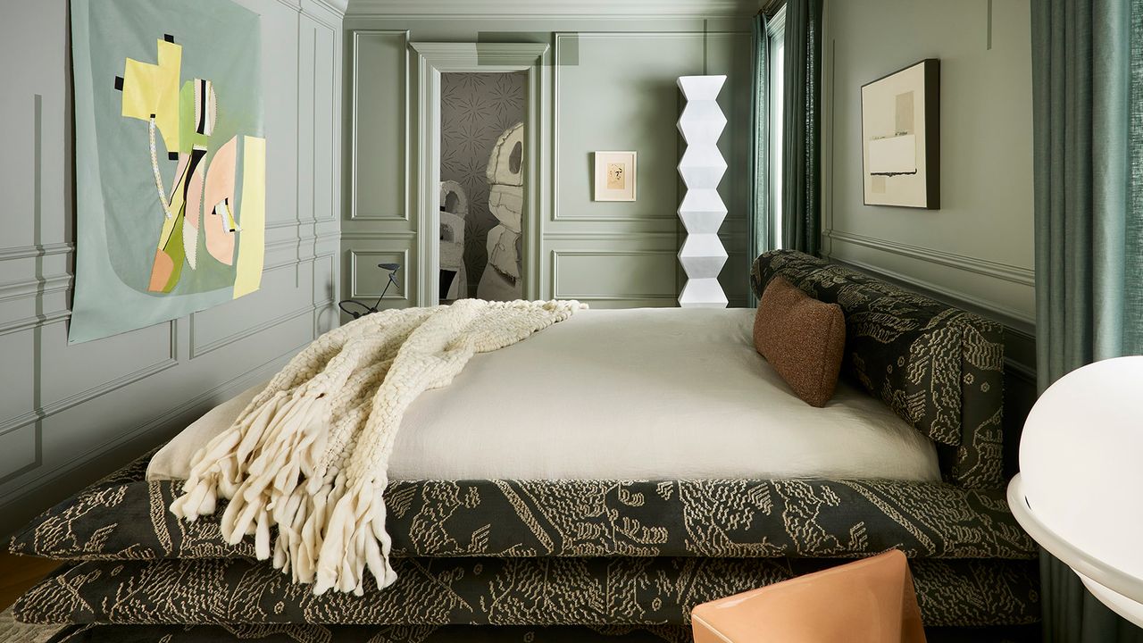 a sage green bedroom