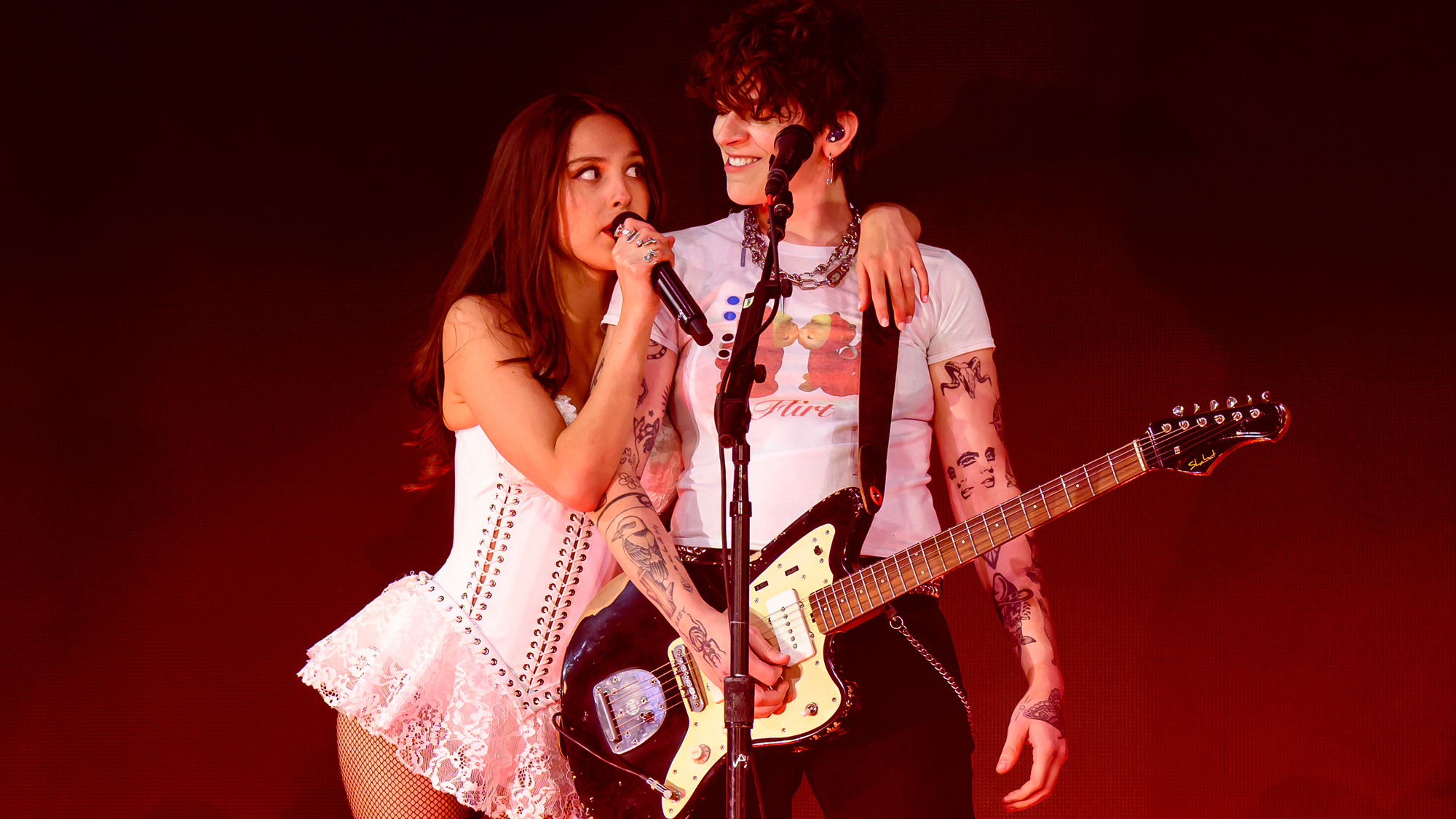 Olivia Rodrigo performs with Robert Smith (R) onstage during day five of the Glastonbury Festival 2025 at Worthy Farm, Pilton on June 29, 2025 in Glastonbury, England.