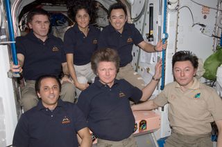 Expedition Crew Poses Following Changing-of-Command Ceremony