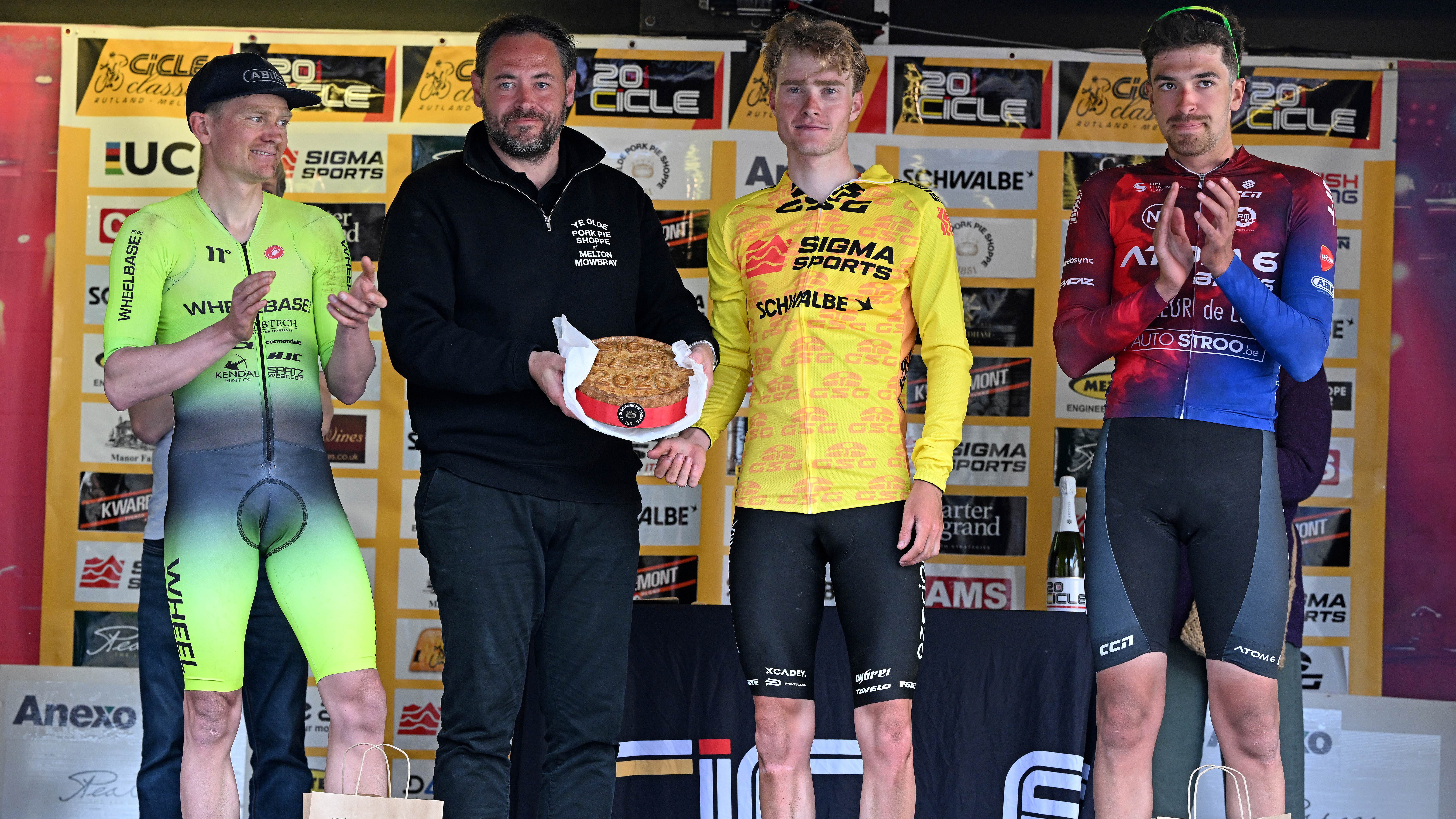 Otto van Zanden (Azerion Villa Valkenburg) gets a pie on the CiCLE Classic podium