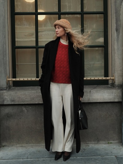 Anouk Yve in a sweater and ribbed pants.
