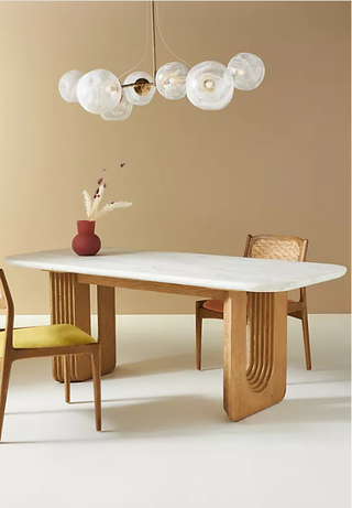 Sculputural design dining table from Anthropologie.