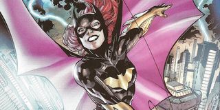 Batgirl swinging on cable