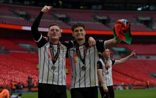 Macaulay Langstaff and Ruben Rodrigues celebrating promotion at Wembley