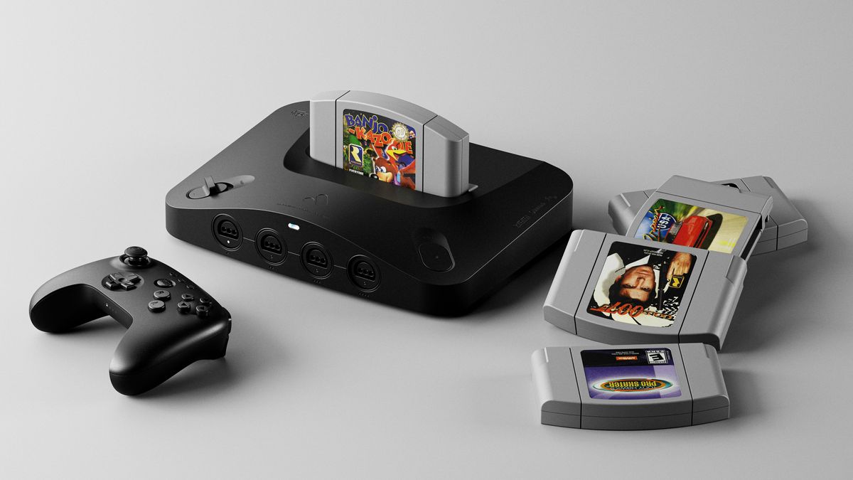 Analogue 3D console in black surrounded by the 8BitDo 64 Bluetooth controller and a variety of N64 cartridges