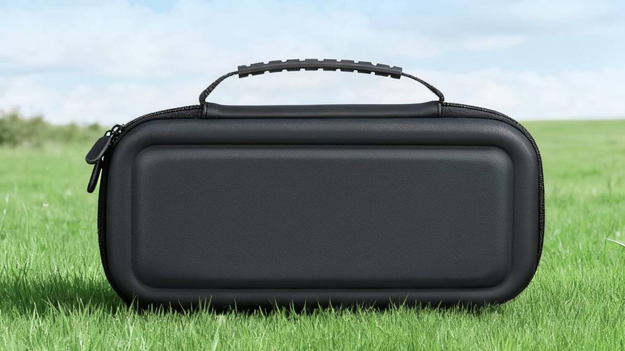The CoBak ROG Xbox Ally Carry Case on a green field.