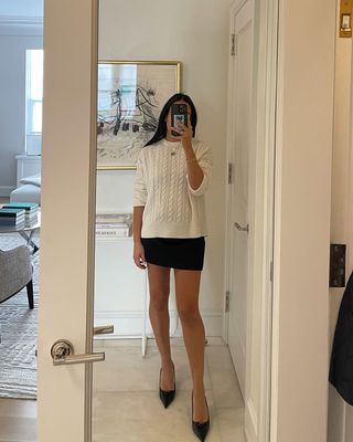 @nicoleakhtarzad outfit mirror selfie sweater and skirt