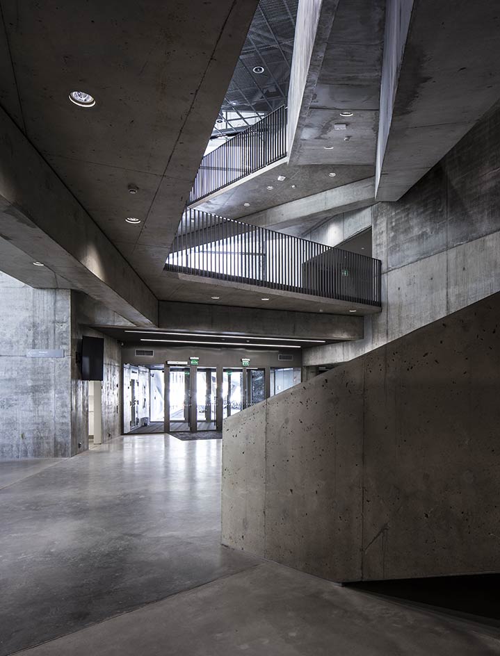 A view of a building inside looking at the entrance