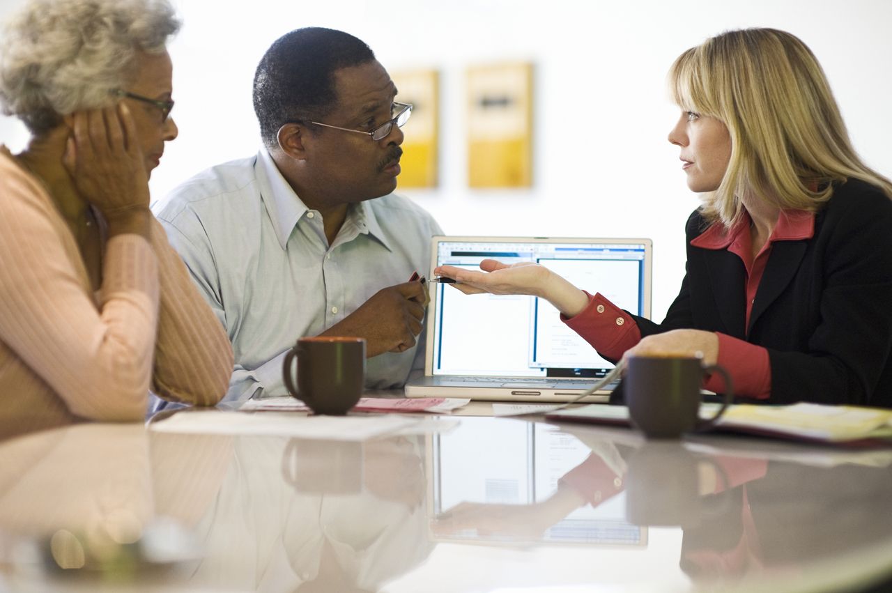 Financial Advisor Assisting Senior Couple